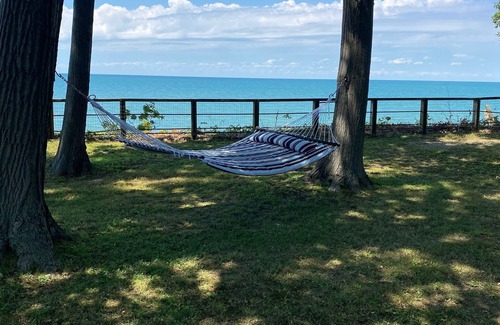 Irving Casa | Lake Front Home. Private stairs to private beach and bay. upscale 5 bedroom home