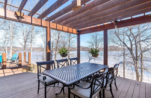 Stewart Casa | Lake front with dock and boat ramp