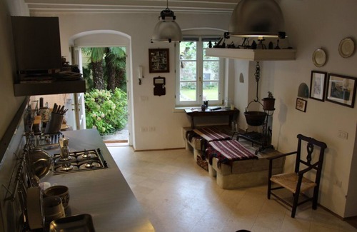 Torbole sul Garda Casa | Lago de Garda: villa idílica en un tranquilo pueblo con olivos y palmeras