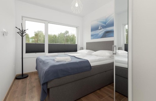 Uniescie Casa | Lake House Sosnowy Las Mielno by Noclegi Renters