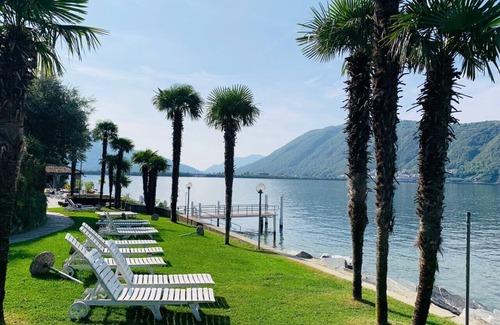 Bissone Apartamento | Lake view apartment with terrace, outdoor pool and parking space