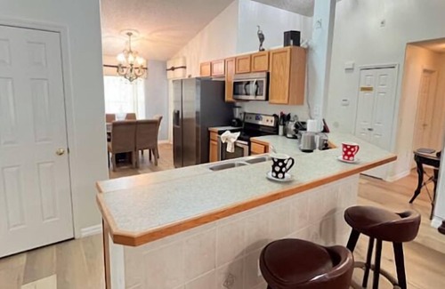 Crescent Lakes Casa | Lake View - South Facing Pool & Spa - Game Room - Nr Disney - Quiet Community