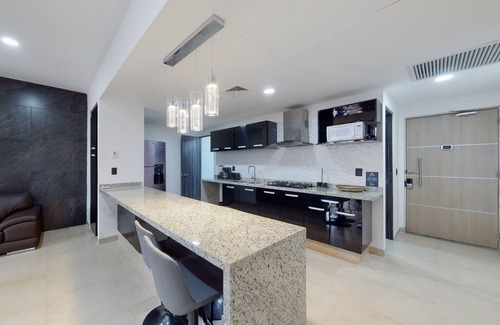 Downtown Cancun Apartamento | Lakefront apartment with pool, fitness room, washer/dryer, & patio