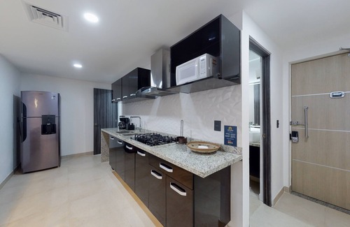 Downtown Cancun Apartamento | Lakefront apartment with pool, fitness room, washer/dryer, & patio