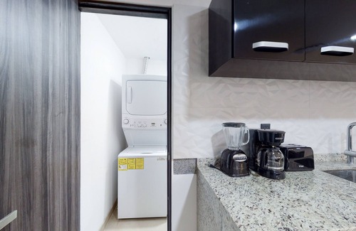Downtown Cancun Apartamento | Lakefront apartment with pool, fitness room, washer/dryer, & patio