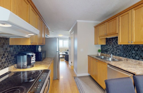 Wasaga Beach Casa | Lakefront condo steps to the beach with pool, and fireplace