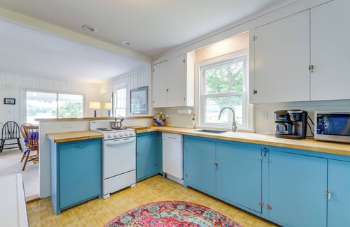 Coventry Lake Cabaña | Lakefront Cottage w/ Covered Porch & Dock!
