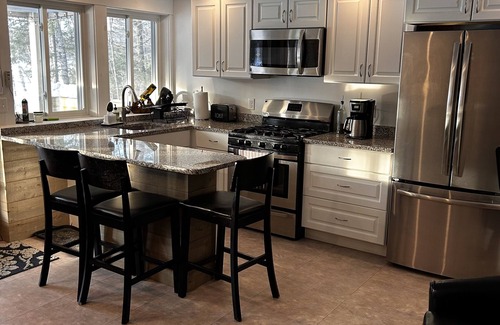 Greenville Casa | Lakefront family retreat close to town with hot tub, tiki bar and fire pits