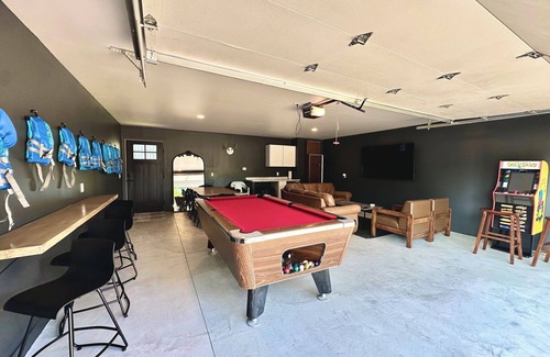 Prudenville Casa | Lakefront Home: Hot Tub, Paddle Boards, Game Room