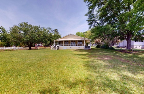 Prosperity Casa | Lakefront home with incredible sunset view, private dock, screened porch, and AC