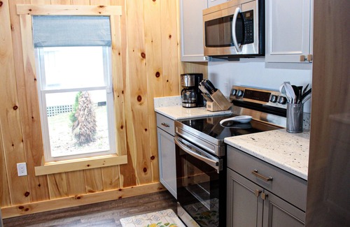 Laconia Cabaña | Lakefront home with a deck, gas grill, WiFi, dock & golf nearby
