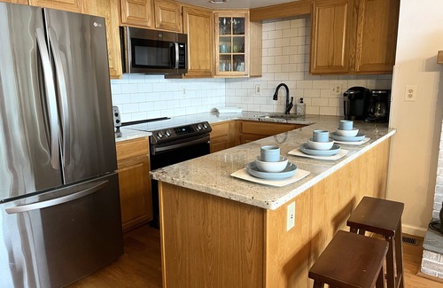 Pocono Lake Casa | Lakefront - Hot Tub, AC, 7 Paddleboards, Canoe, Kayak, Golf Car, Fire Pit, Boat