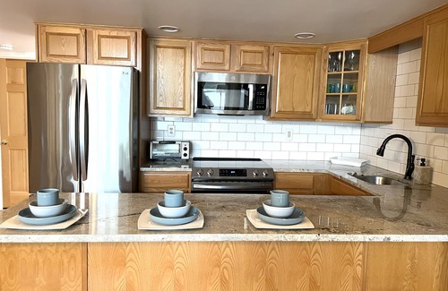Pocono Lake Casa | Lakefront - Hot Tub, AC, 7 Paddleboards, Canoe, Kayak, Golf Car, Fire Pit, Boat