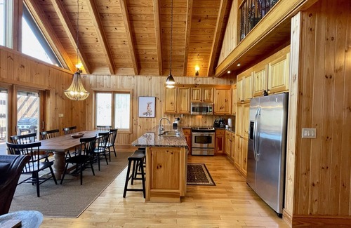 Six Mile Casa | Lakefront house with multiple outdoor areas, fire pit, dock and two kayaks
