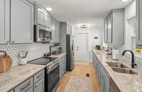 Bella Vista Casa | Lakefront, luxury beds, hot tub, fire pit, game room, private dock & boathouse.