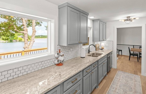 Bella Vista Casa | Lakefront, luxury beds, hot tub, fire pit, game room, private dock & boathouse.
