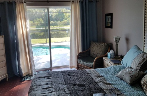 Eagle Pointe South Casa | Luxury Lakefront Pool Home: a solo 15 minutos de Disney World