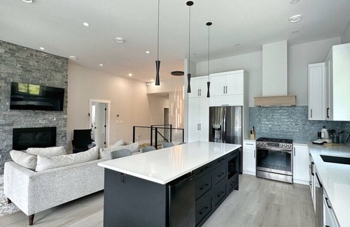 Youbou Casa | Lakefront Retreat with a Sauna, Hot Tub & Private Beach Access