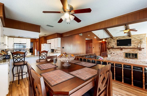 Kemp Casa | Lakefront retreat near golf course with serene wraparound deck, fireplace, & AC