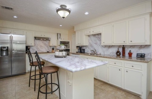 April Sound Casa | Lakefront Retreat with Pool, Spa, Golf, Fishing, Boat slip, Kayaks & Marina
