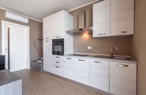 Marone Apartamento | Retiro frente al lago con jardín