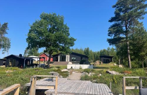 Malsryd Casa | Lakehouse med bastu, egen brygga och roddbåt
