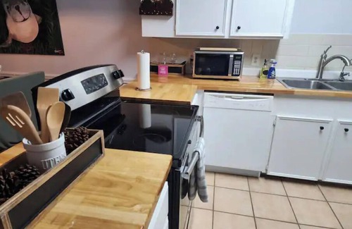 South Side Casa | Large 2 bedroom Townhome, Backyard, Covered Patio, Private covered parking.