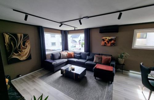 Stavanger Apartamento | Large and central 2 bedroom apartment with Free parking, Free EV recharging and a private garden