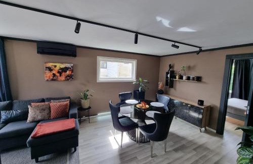 Stavanger Apartamento | Large and central 2 bedroom apartment with Free parking, Free EV recharging and a private garden