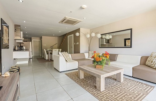 Palm Beach Apartamento | Palm Beach: gran condominio familiar con patio privado. No se necesita coche.