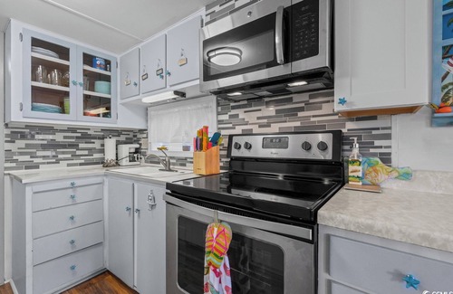 Surfside Beach Complejo | Large outdoor area straight shot to the beach. Stocked coffee bar with expresso!