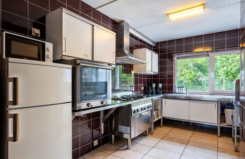 Gasselternijveen Casa | Casa grupal con chimenea cerca del agua
