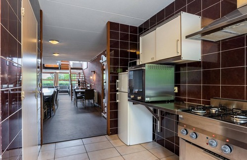 Gasselternijveen Casa | Casa grupal con chimenea cerca del agua