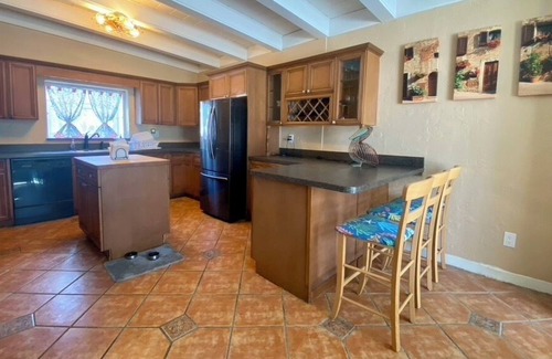 Belle Vista Casa | Large Pool Home 15 min Walk to the Beach, Close to Everything