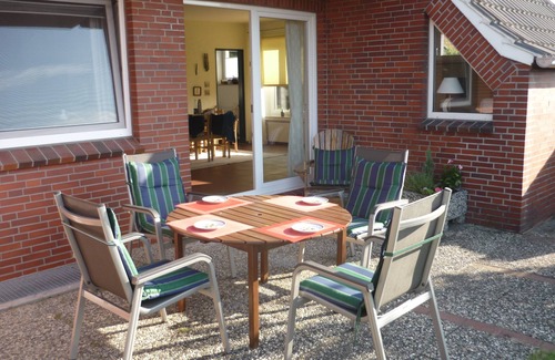 Spiekeroog Casa | Large semi-detached house with beautiful south-facing terrace and garden and view of the dune