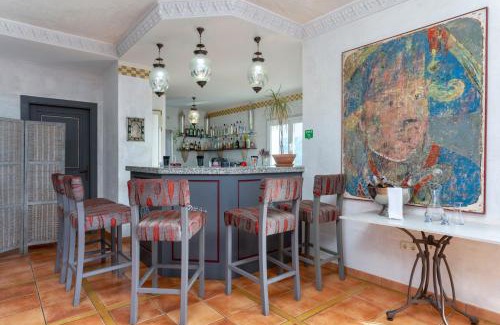 Vinuela Casa | Las Orquídeas