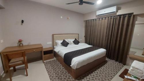 Nedumbassery Apartamento | Lavender Airport suits