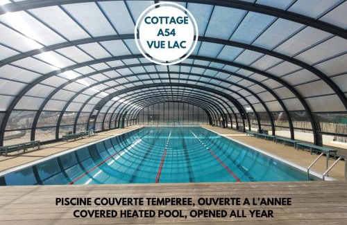 Leon Apartamento | LE COTTAGE VUE LAC-2 vélos-Village Vacances Nature de 70ha! avec piscines et animations