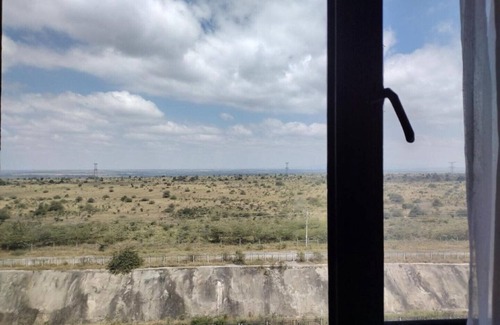 Syokimau Apartamento | Lenayan Park View.Calming Views of Nairobi National Park from your room/balcony!