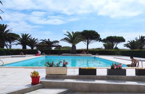 Saint-Cyprien Plage Apartamento | LES CAPITELLES 5 - Accès direct à la plage depuis le jardin - T2 avec cabine - 6 pers - jardin - Piscine - parking