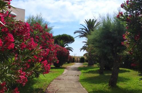 Saint-Cyprien Plage Apartamento | LES CAPITELLES 5 - Accès direct à la plage depuis le jardin - T2 avec cabine - 6 pers - jardin - Piscine - parking
