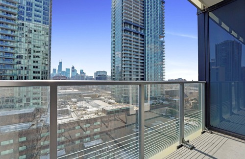 Near North Side Hotel | Level Old Town - Two Bedroom Suite with full kitchen, living room, and laundry