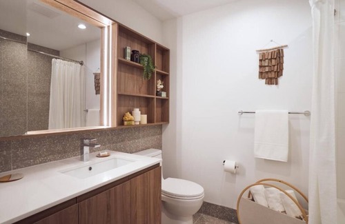 Killgubbin Hotel | Level Spacious one bedroom suite with king bed, walk-in closet, full kitchen.