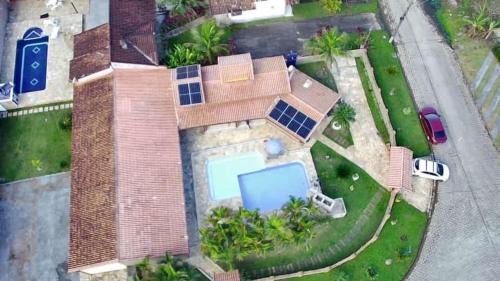 Morada da Praia Casa | Linda casa com piscina privativa Morada da Praia 3 quartos e 4 banheiros Aceita Pet Wi-fi na casa toda Área gourmet com churrasqueira acomoda até 15 pessoas com muito conforto 2 bicicletas disponíveis para um passeio pelo condomíno