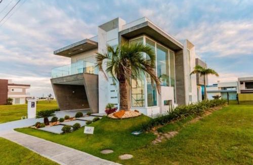 Capao da Canoa Casa | Linda casa de alto padrão condomínio Ilhas Resort