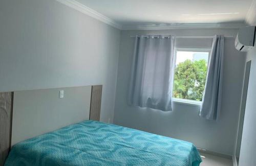 Piratuba Apartamento | Lindo Apto NOVO na Avenida, climatizado e aconchegante