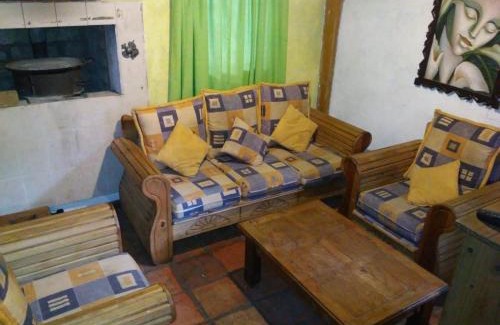 Arteaga Cabina | Lion king cabin woods