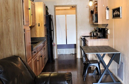 Concan Cabaña | Little Frio Cabin - Quaint Log Cabin, Tucked Amongst the Trees