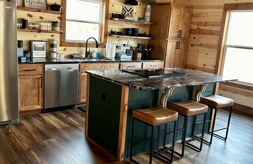 Athens Cabina | Livin on the Edge Cabin in Albert Pike Recreation Area. Beautiful place to stay!