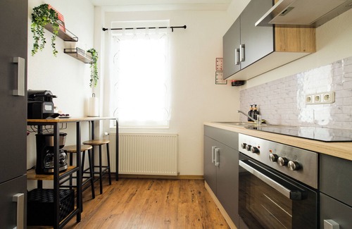 Fulda Apartamento | Living La Christal apartment with workspace & games